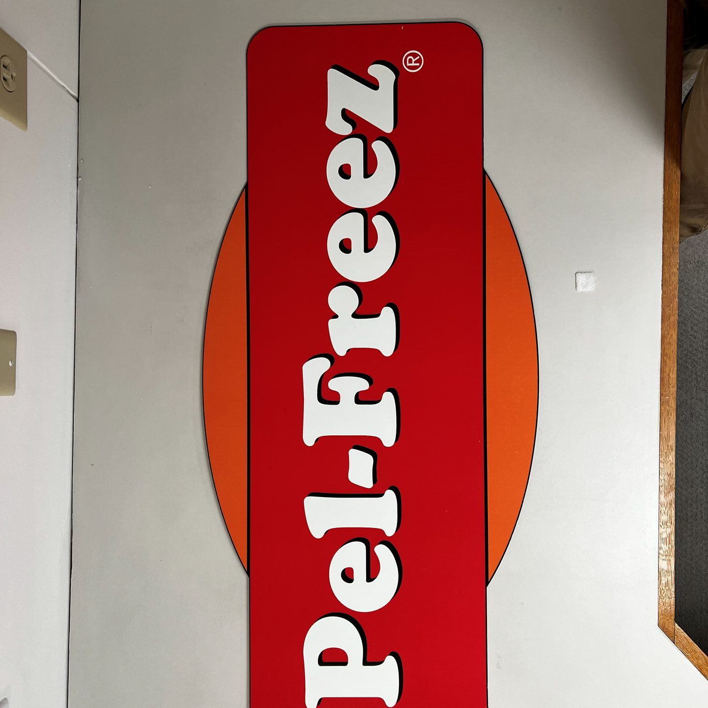 The red Pel-Freez oval, the rabbit-meat brand mark, on display at the Rogers plant